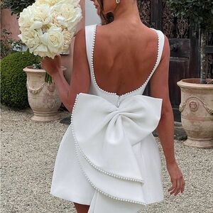 Chic Backless White Dress with Bow